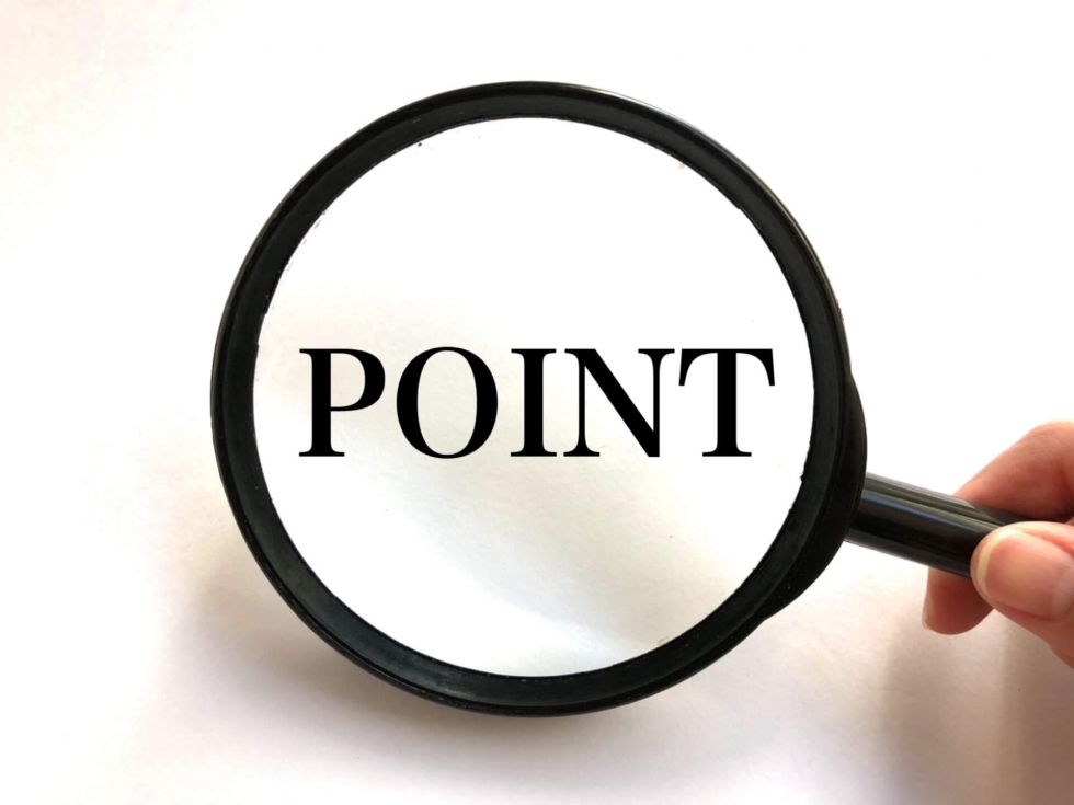 虫眼鏡で強調されたポイント文字